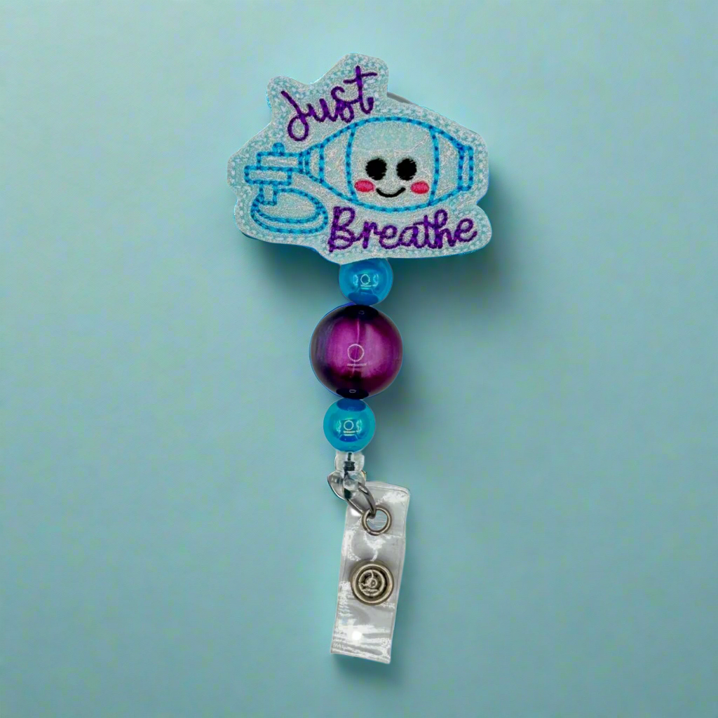 Just breathe badge reel