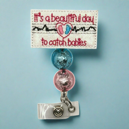 Beautiful Day to Catch Babies Badge Reel