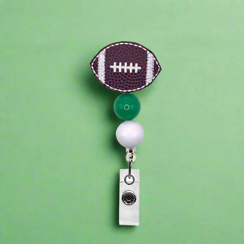 Green and White Football Badge Reel