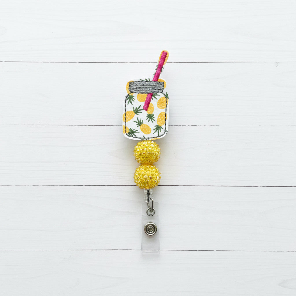 Pineapple drink in a jar badge reel