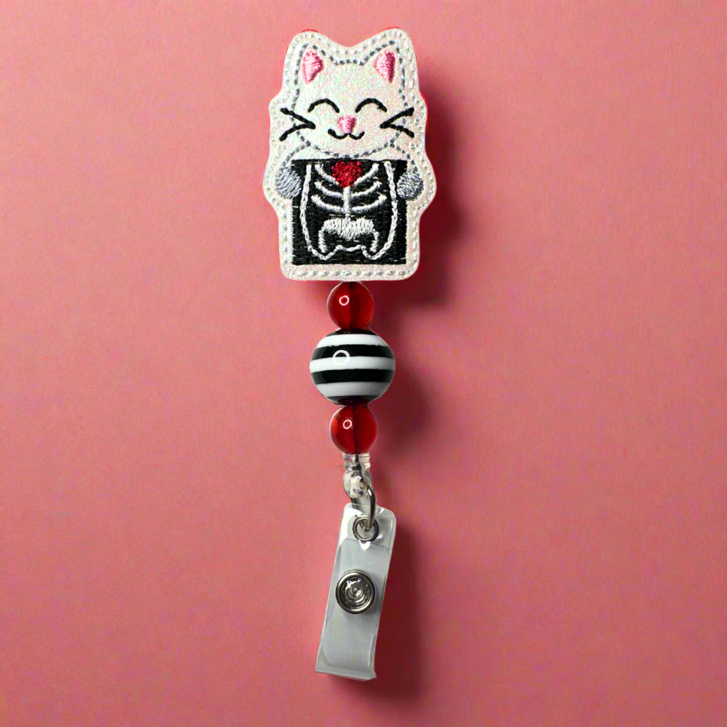 Cat X-Ray Badge Reel