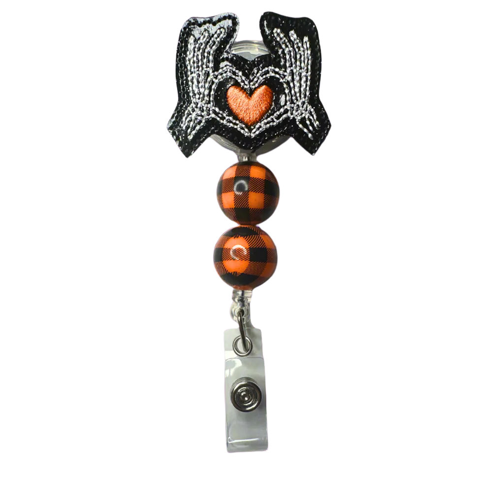 Skeleton Hand Heart Badge Reel
