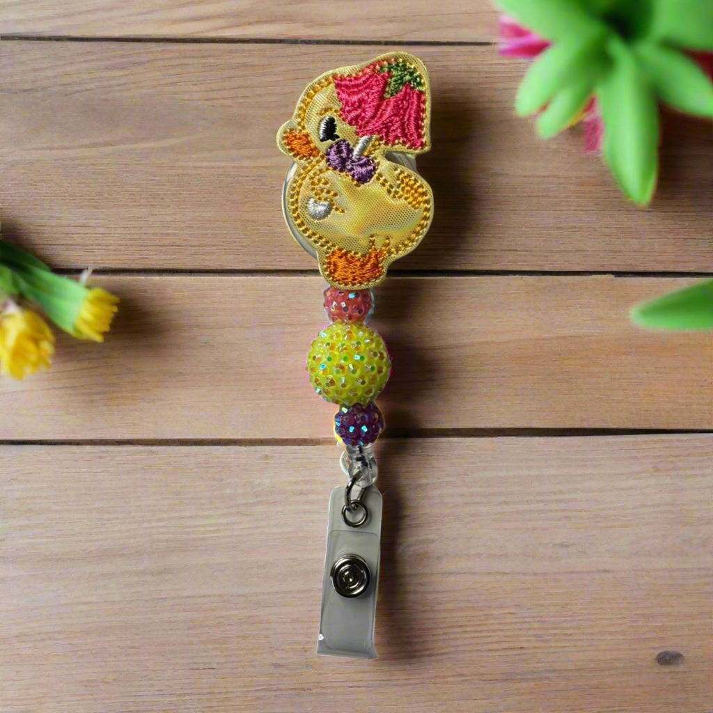 Duck with Flower Umbrella Badge Reel