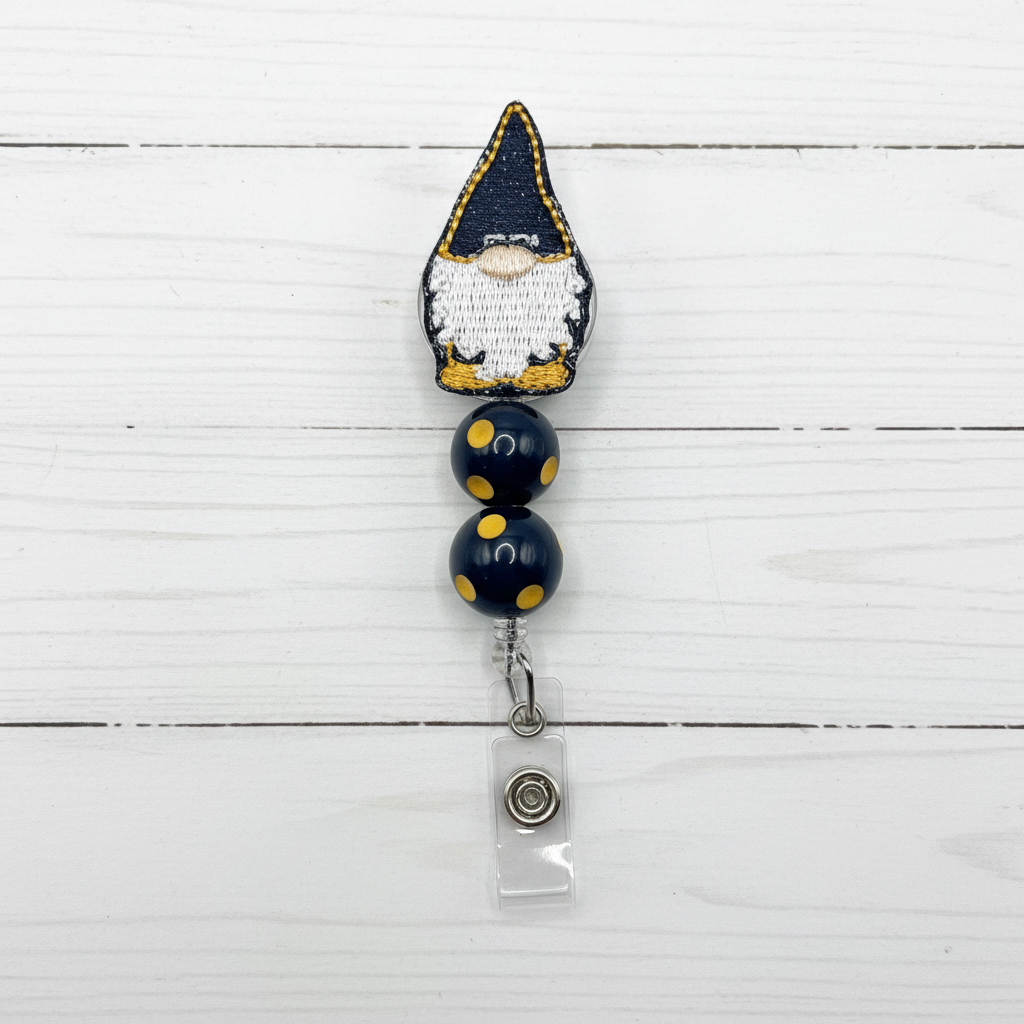 Gnome-shaped badge holder with black and gold accents on a white background
