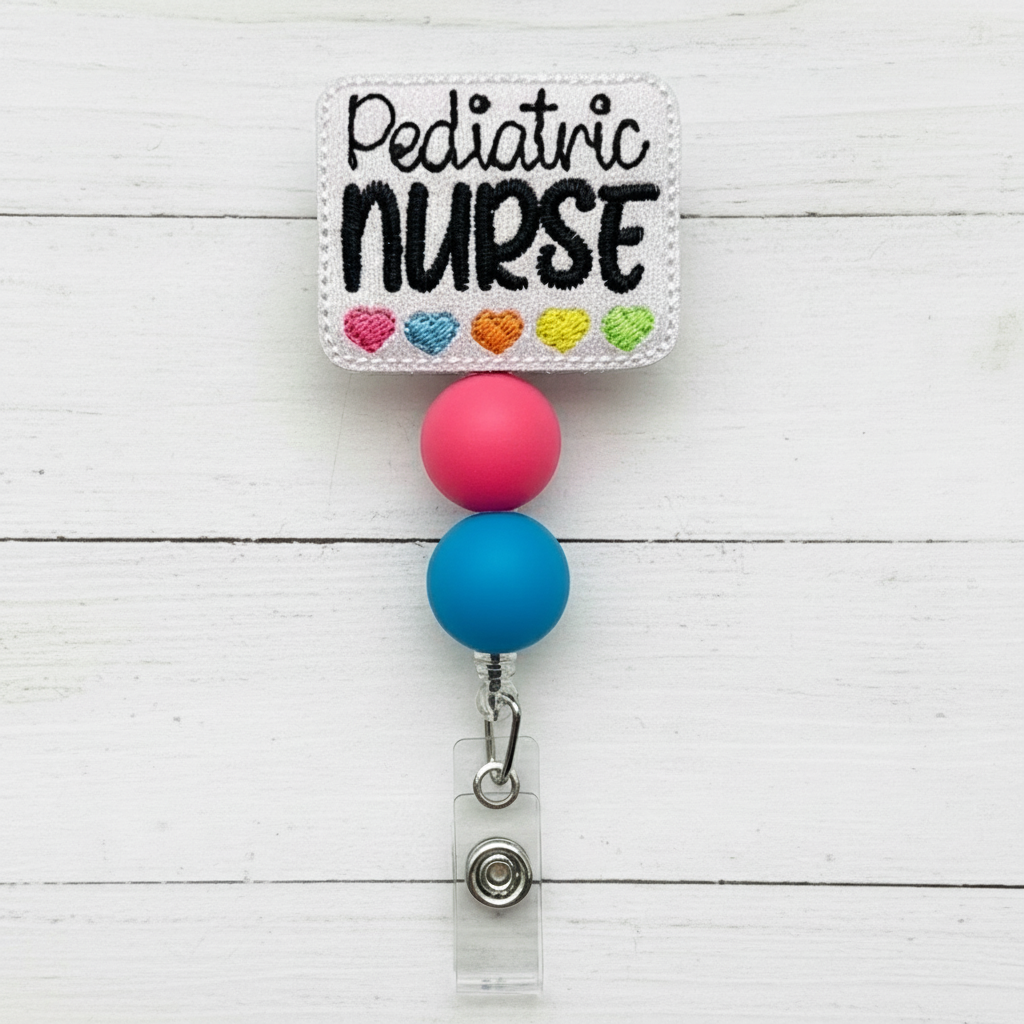 Badge holder with 'Pediatric Nurse' text and colorful heart symbols on a white background