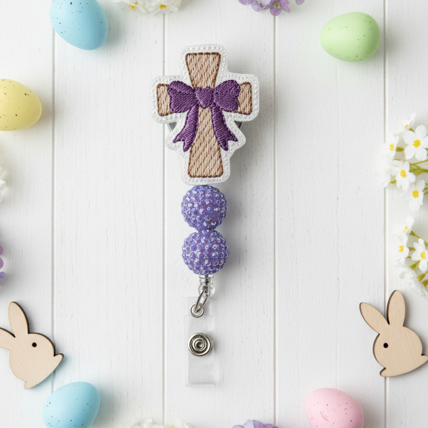 Cross with Bow Badge Reel