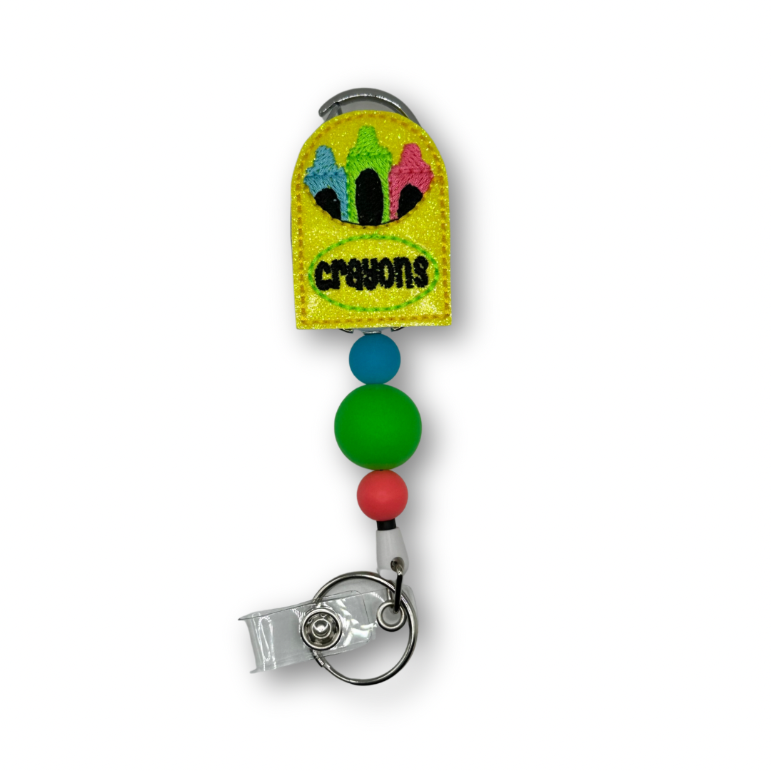Crayons Badge Reel