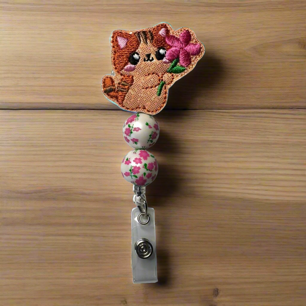 Cat with Flower Badge Reel