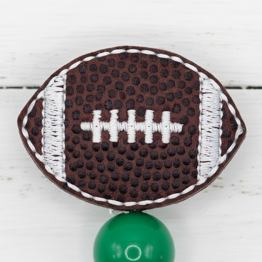 Green and White Football Badge Reel