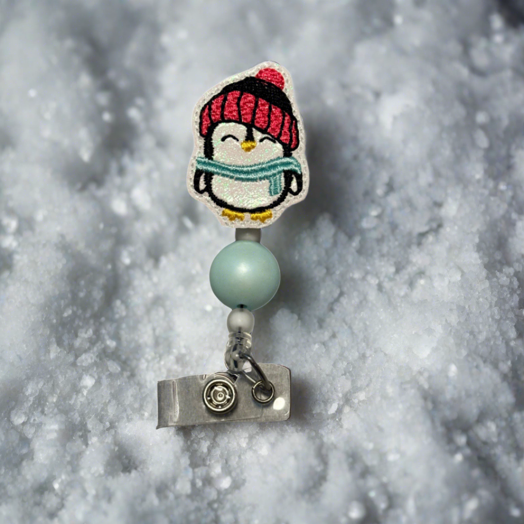 Winter penguin badge reel