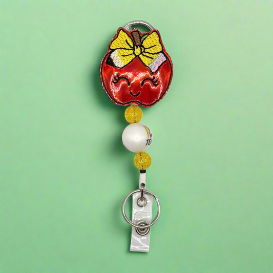 Apple with Bow Badge Reel