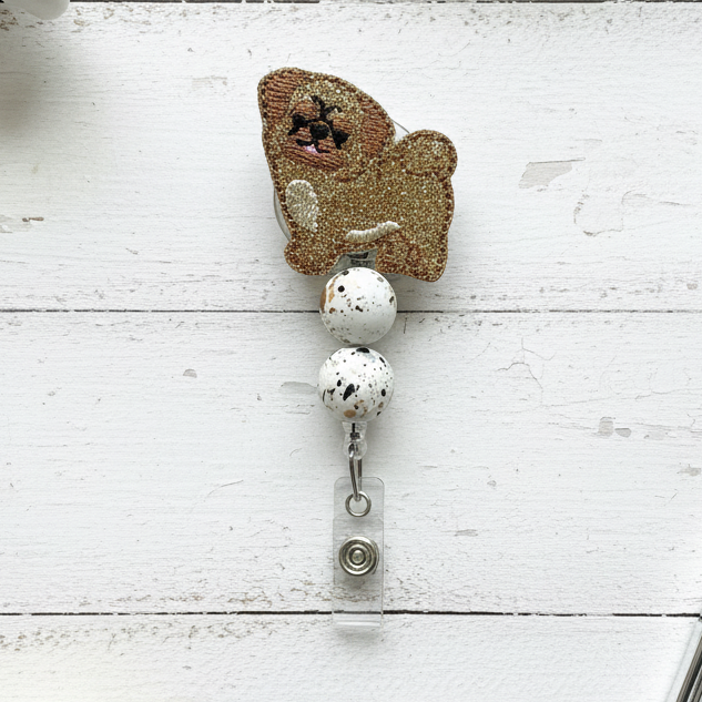 Dog-shaped badge holder with a white background