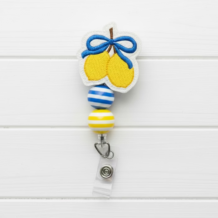 Lemons with Bow Badge Reel