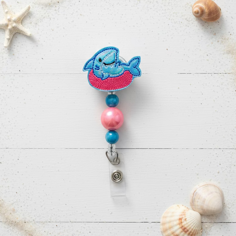 Shark on Innertube Badge Reel