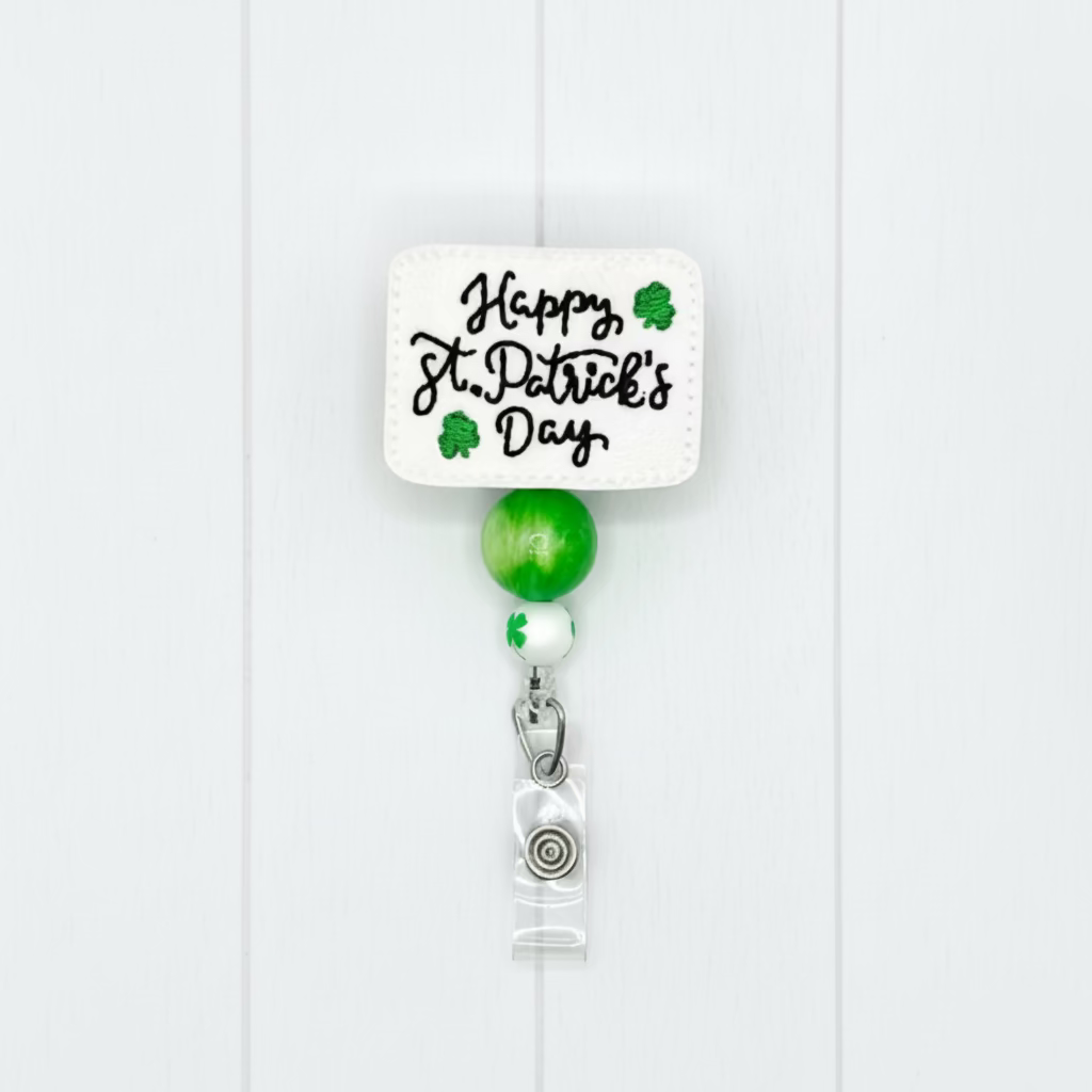 Retractable badge holder with 'Happy St. Patrick's Day' text and green accents on a white background