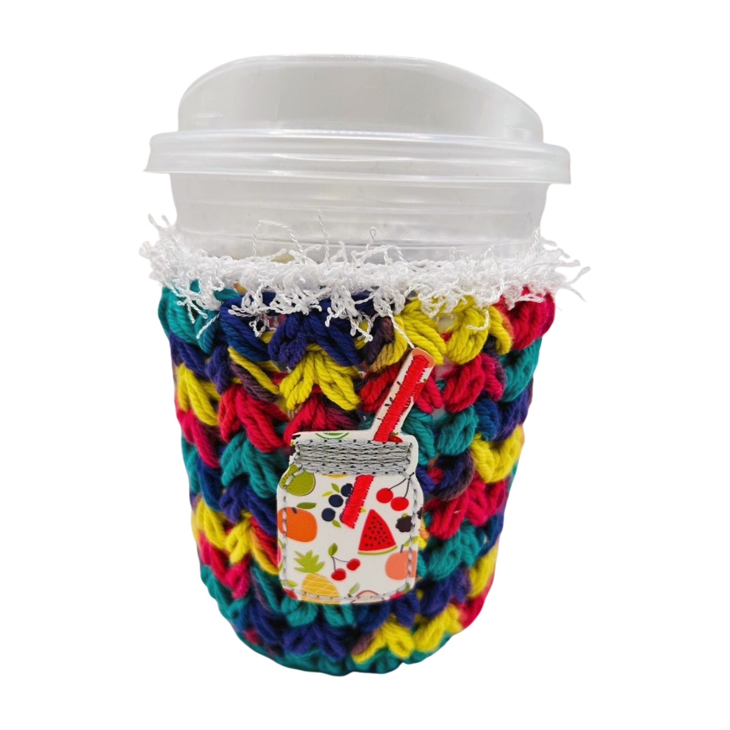 Colorful knitted cup sleeve with a patterned patch on a white background