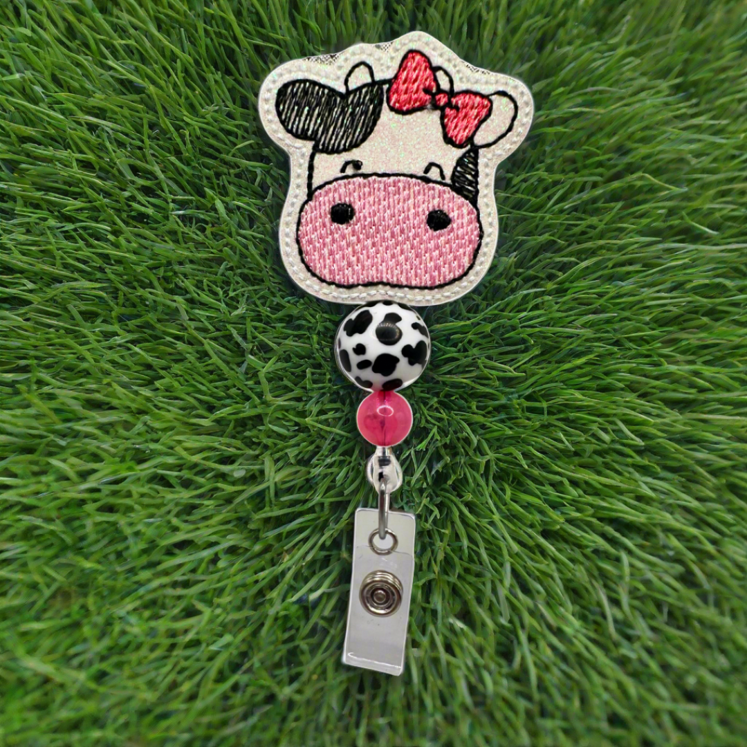 Cow with Bow Badge Reel