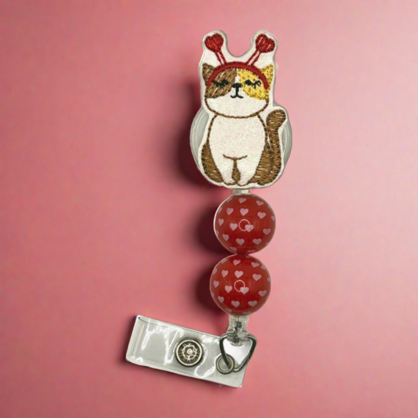 Cat with headband beaded badge reel