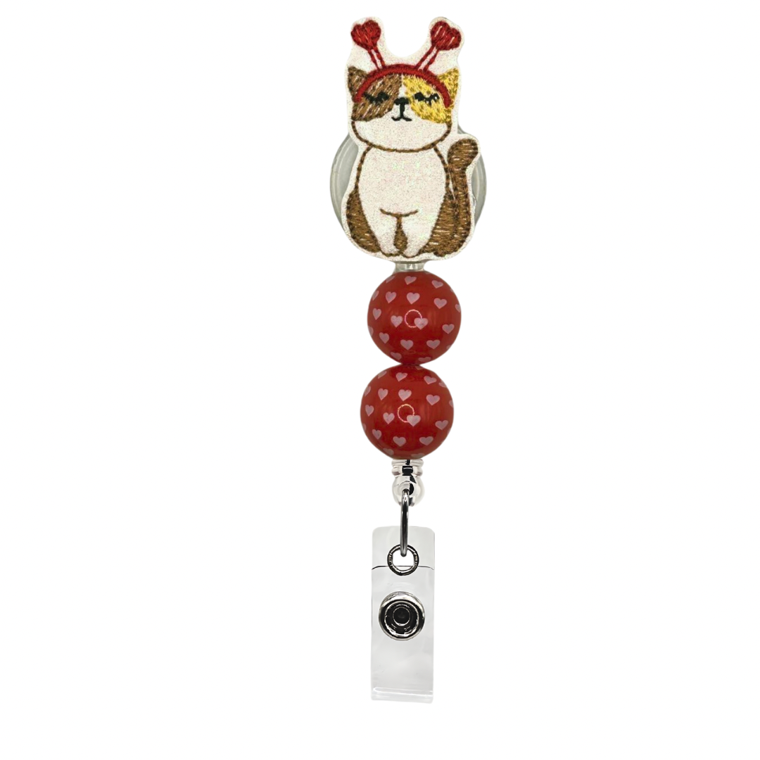 Cat with headband beaded badge reel