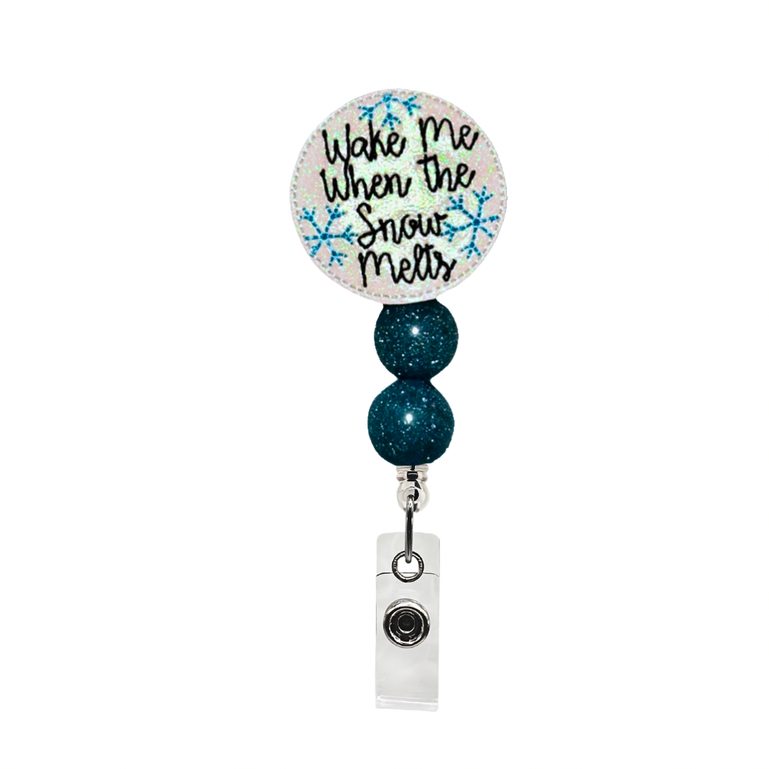 Wake me when the snow melts badge reel