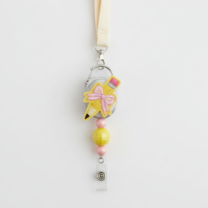 Pencil with Bow Badge Reel