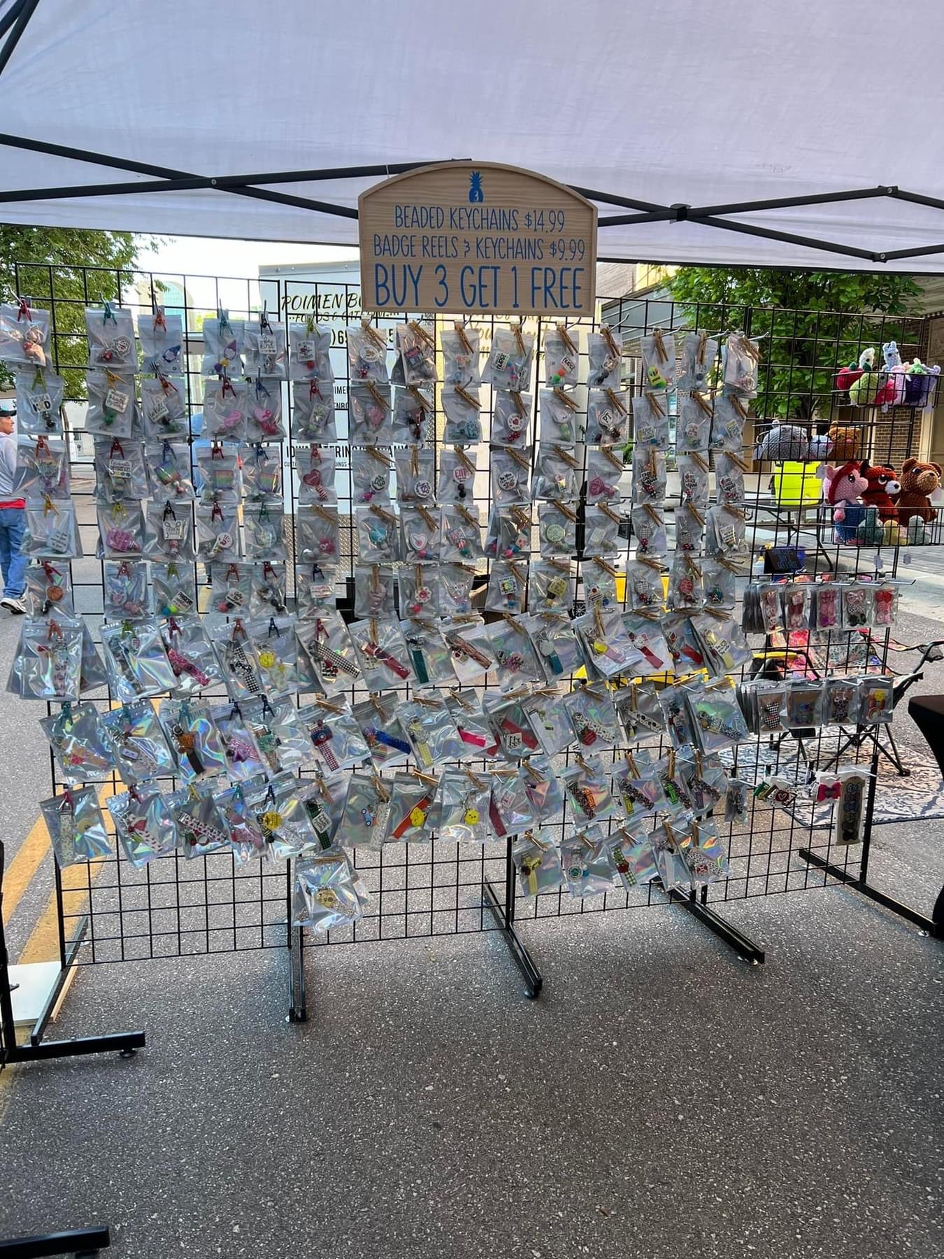 collection of handmade badge reels and keychains