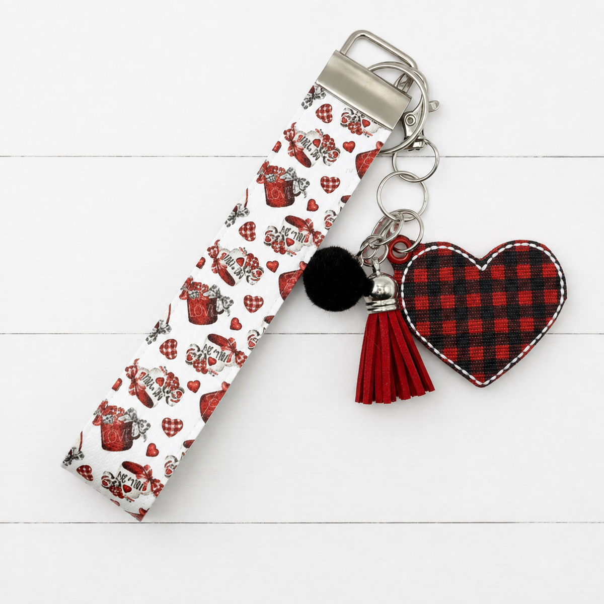 Buffalo Plaid Heart Keychain and Wristlet on clean white painted wood background