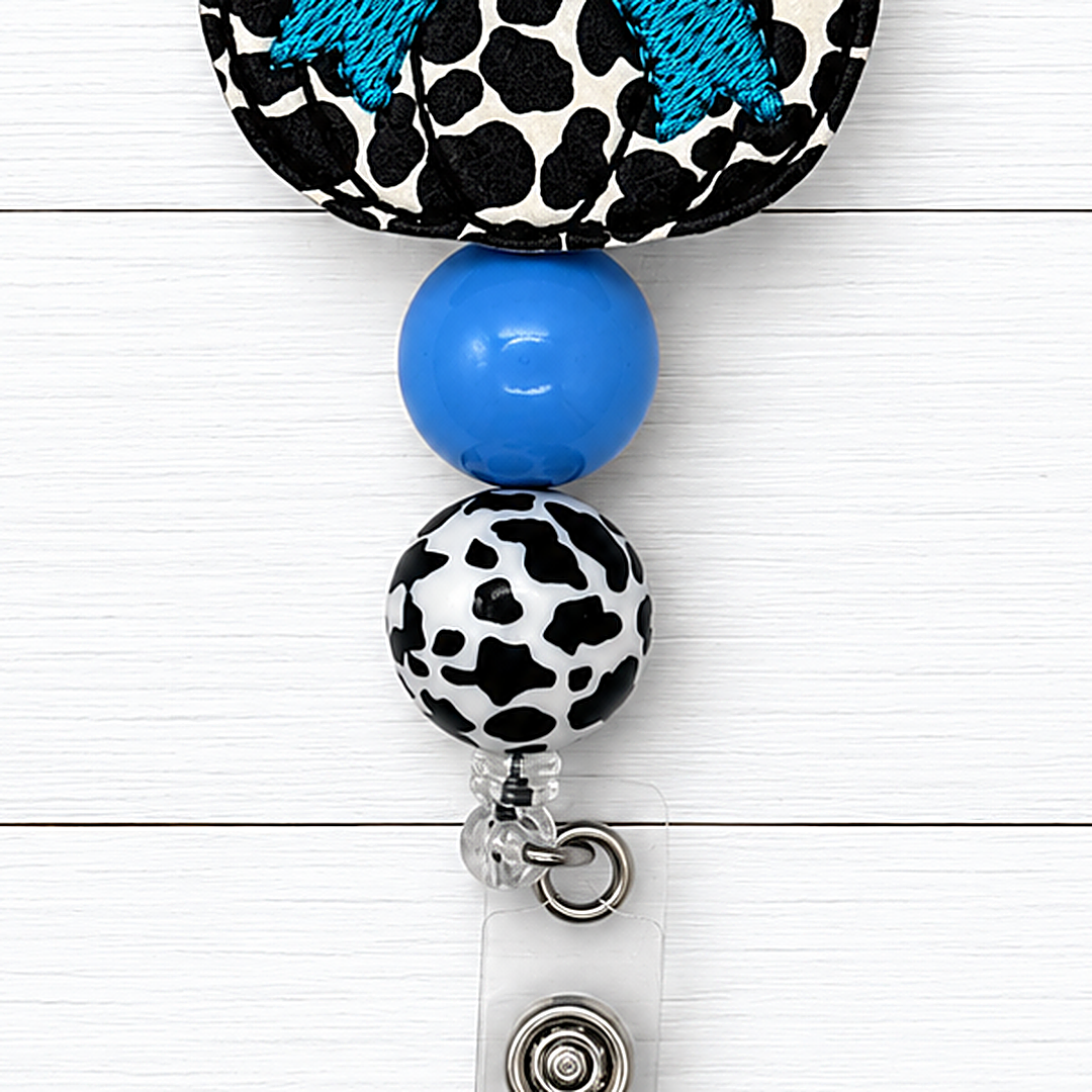 Cow Pumpkin with Bow Badge Reel