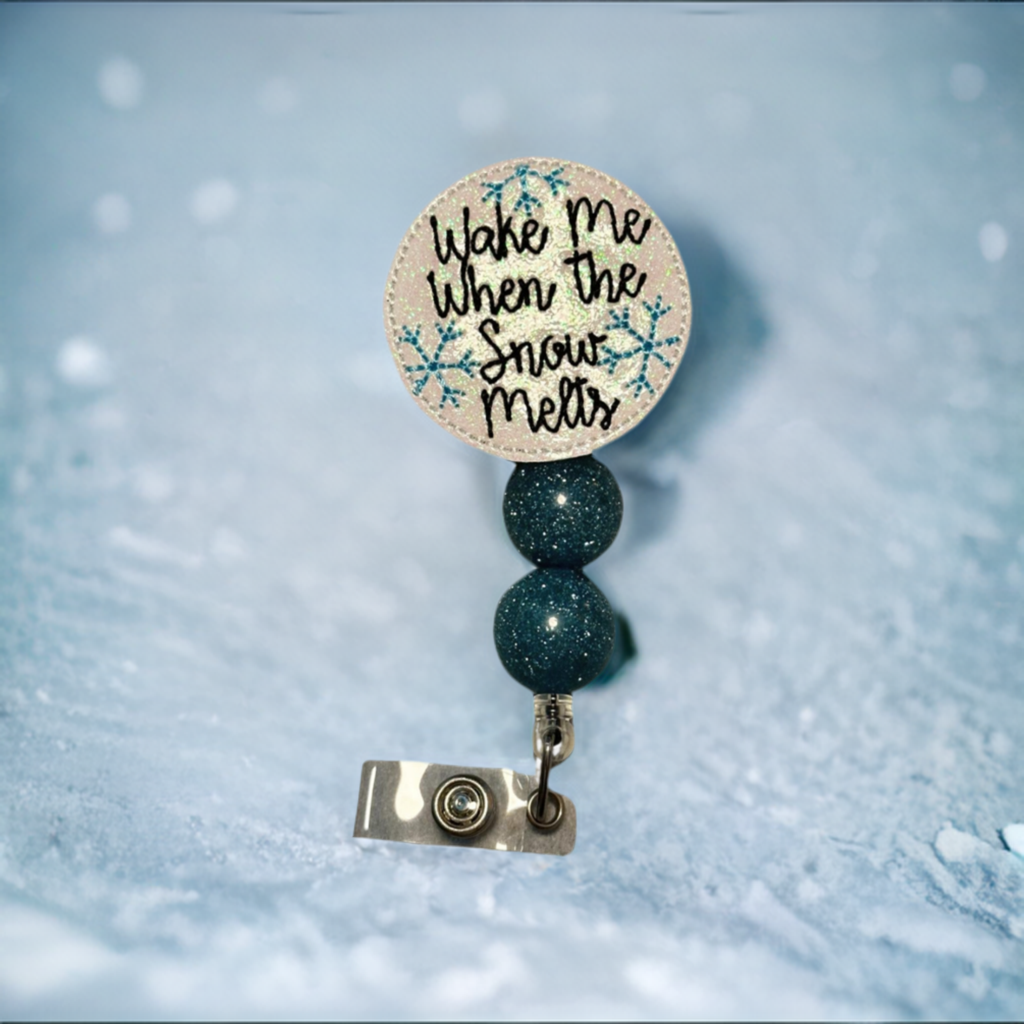 Wake me when the snow melts badge reel