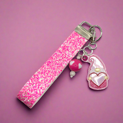 Pink heart gnome with glitter wristlet