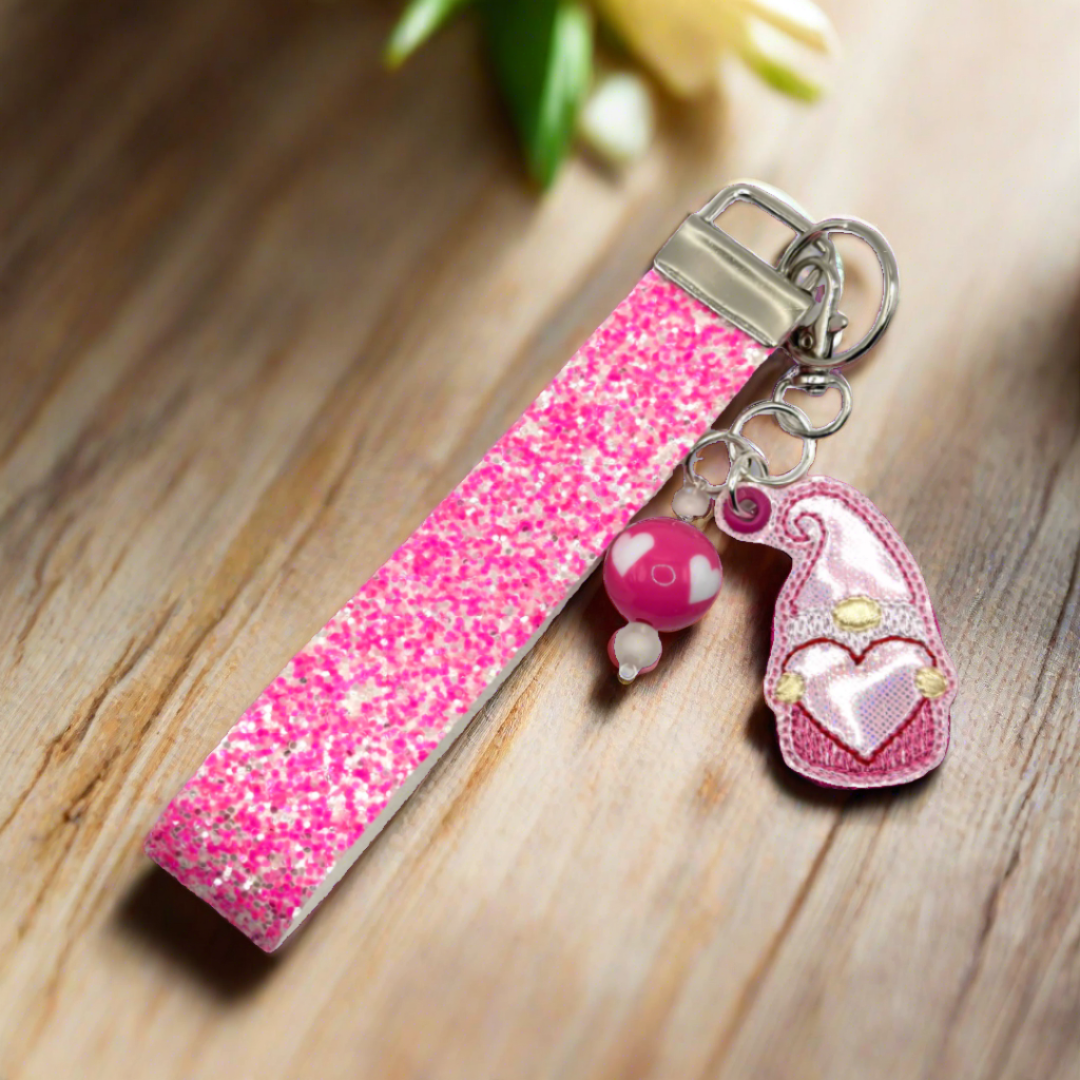 Pink heart gnome with glitter wristlet