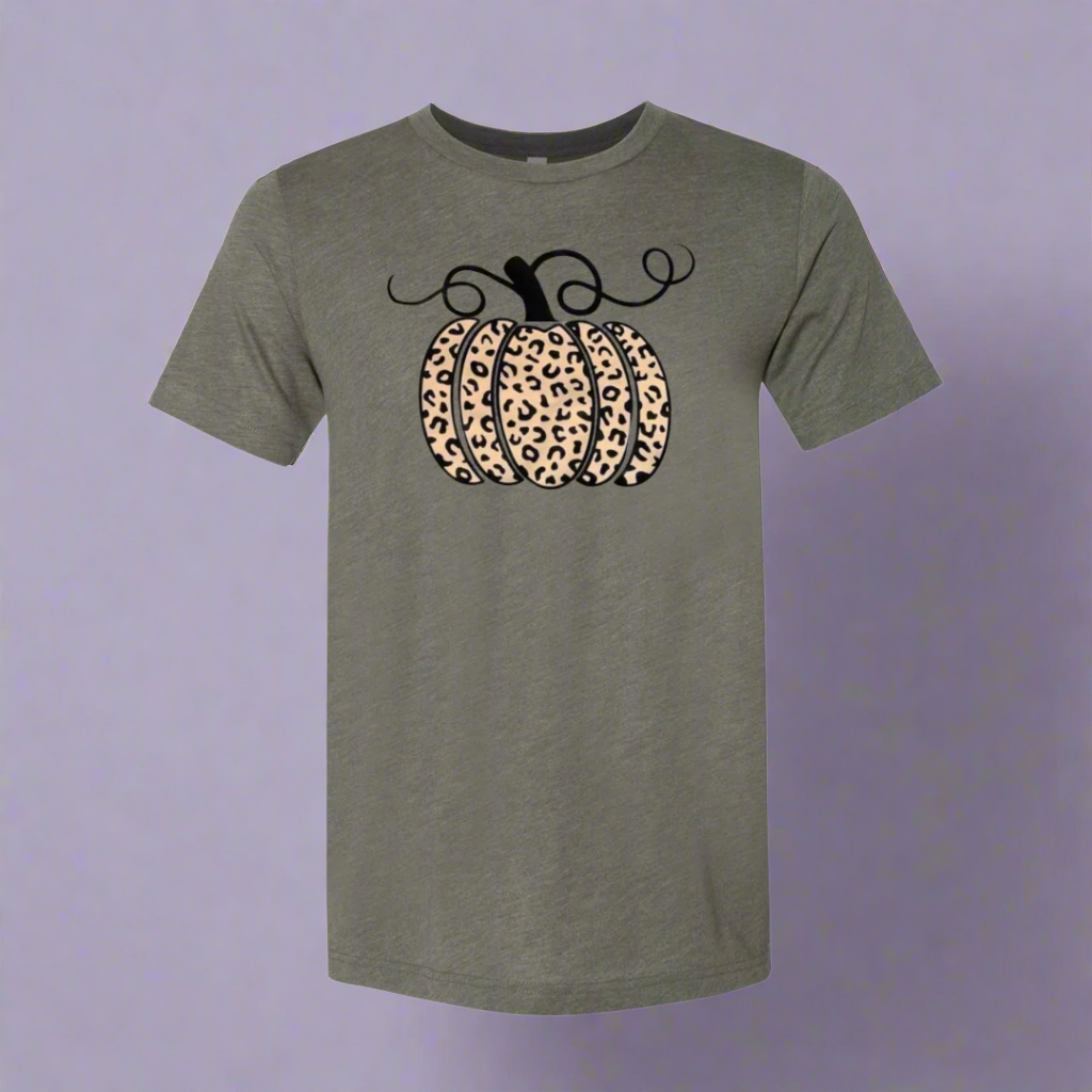Green t-shirt with leopard print pumpkins on a light purple background