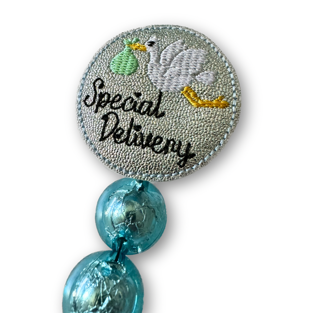 Special Delivery Badge Reel