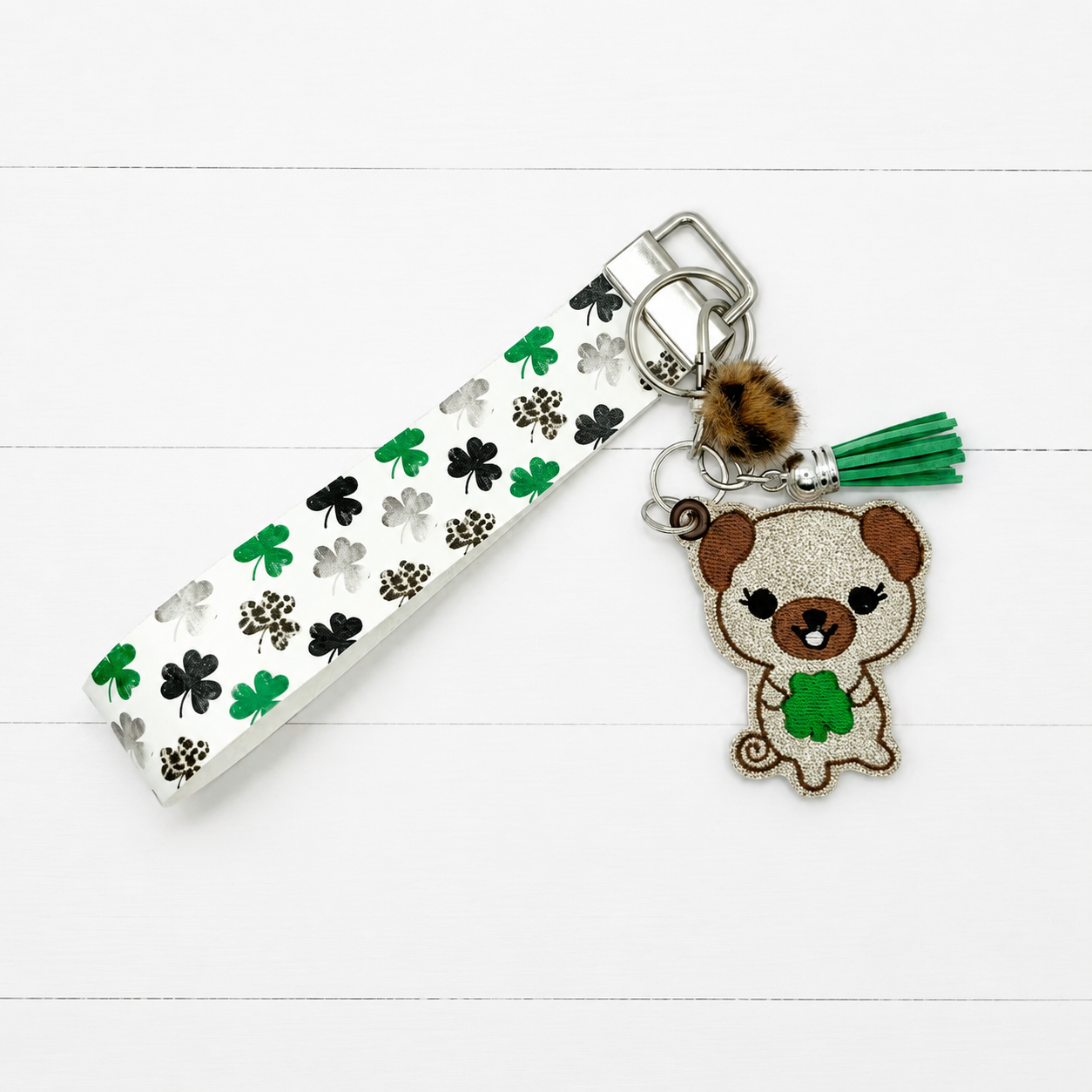 Dog with Shamrock Keychain and Wristlet — clean white wood primary image