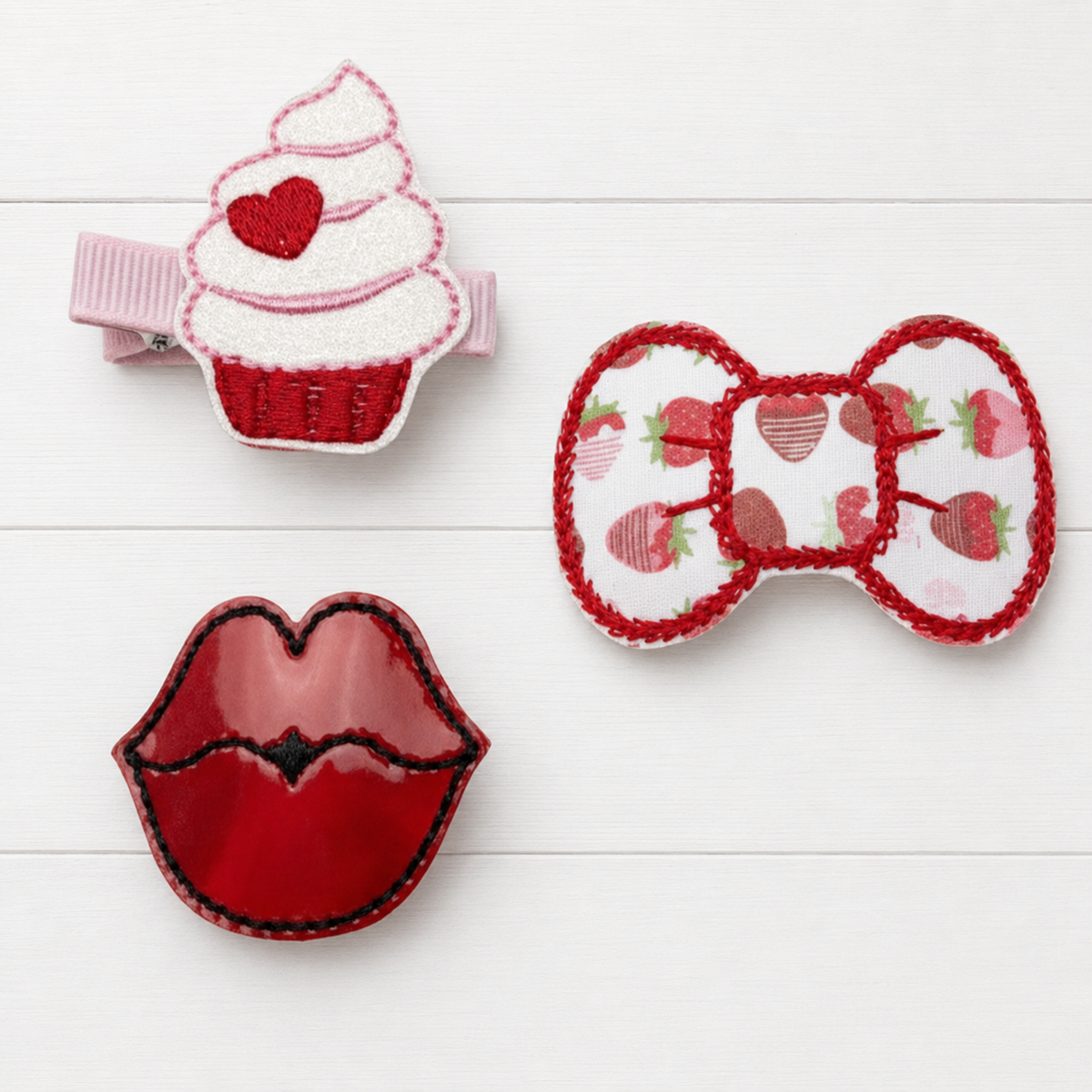 Sweet Treats Hair Bow Clip Set on a clean white wood background