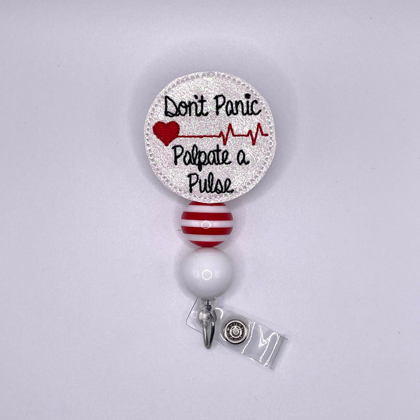 Don’t Panic Palpate a Pulse Badge Reel