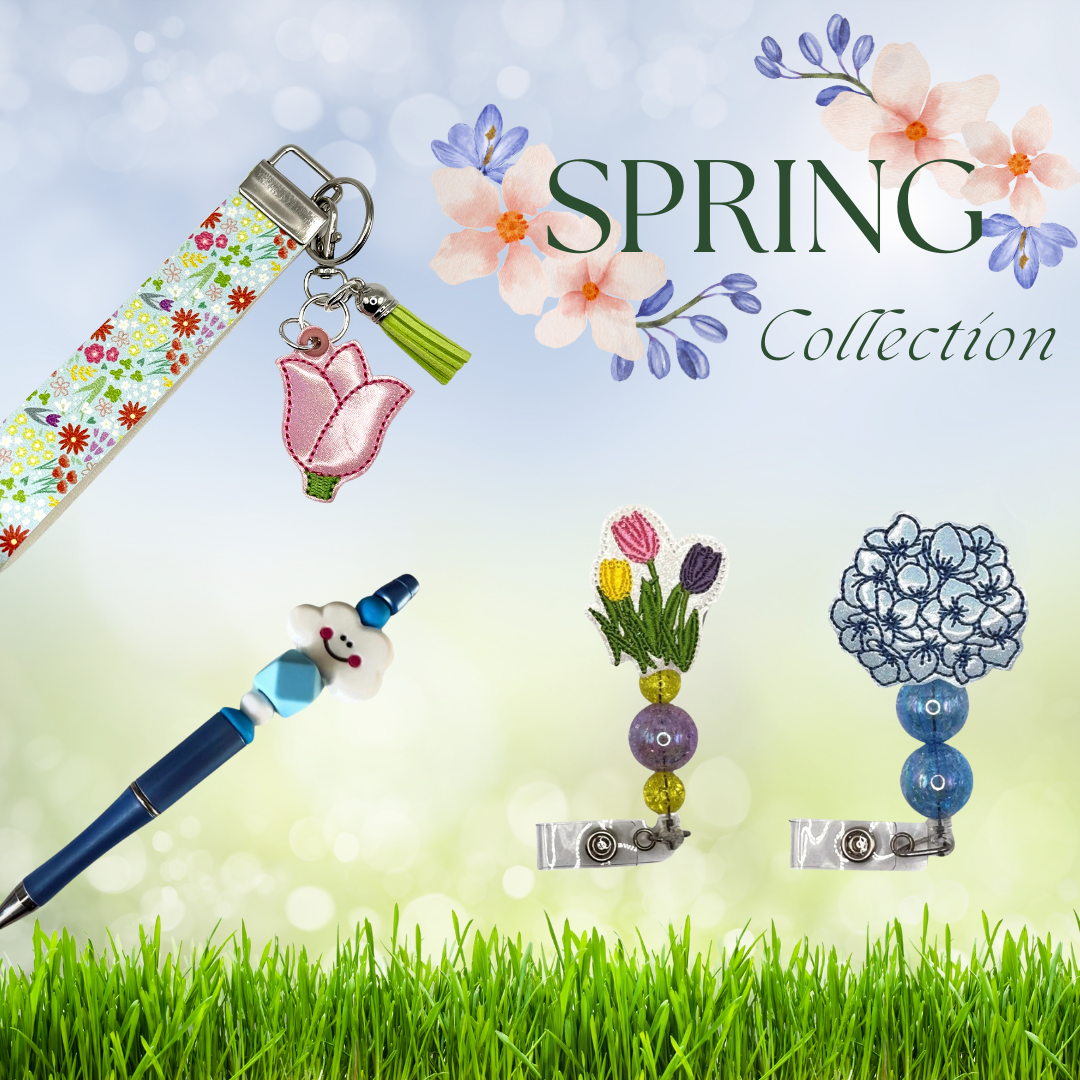 spring collection of flower badge reels, tulip keychains, chick coffee cozies and happy cloud beaded pens