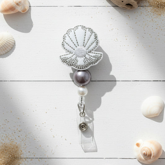 Clam with Pearl Badge Reel