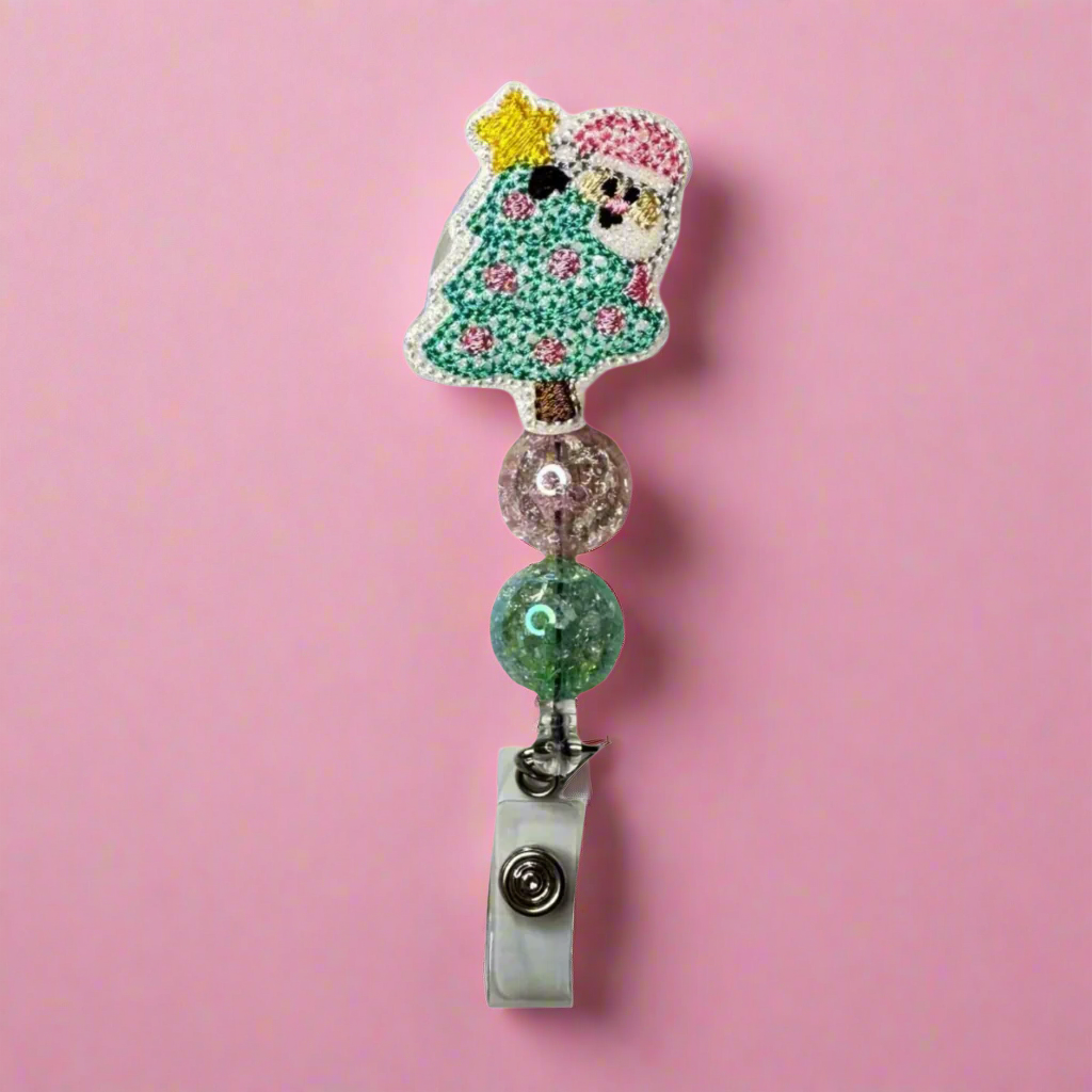 Santa behind Tree Badge Reel