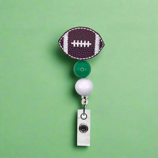 Green and White Football Badge Reel