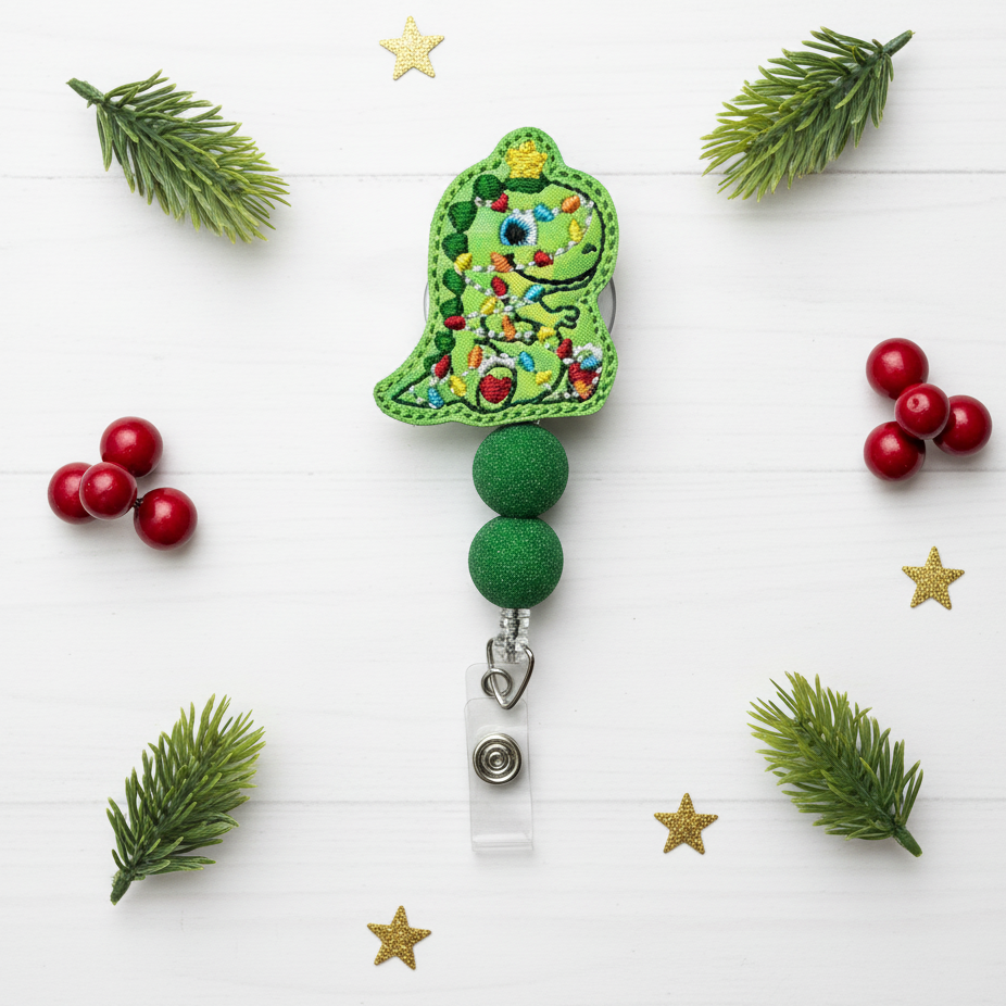 Decorative green badge holder with floral design on a white background