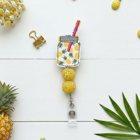 Pineapple drink in a jar badge reel
