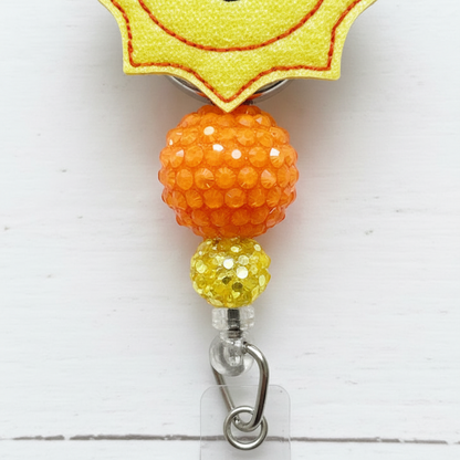 Smiling Sun Badge Reel