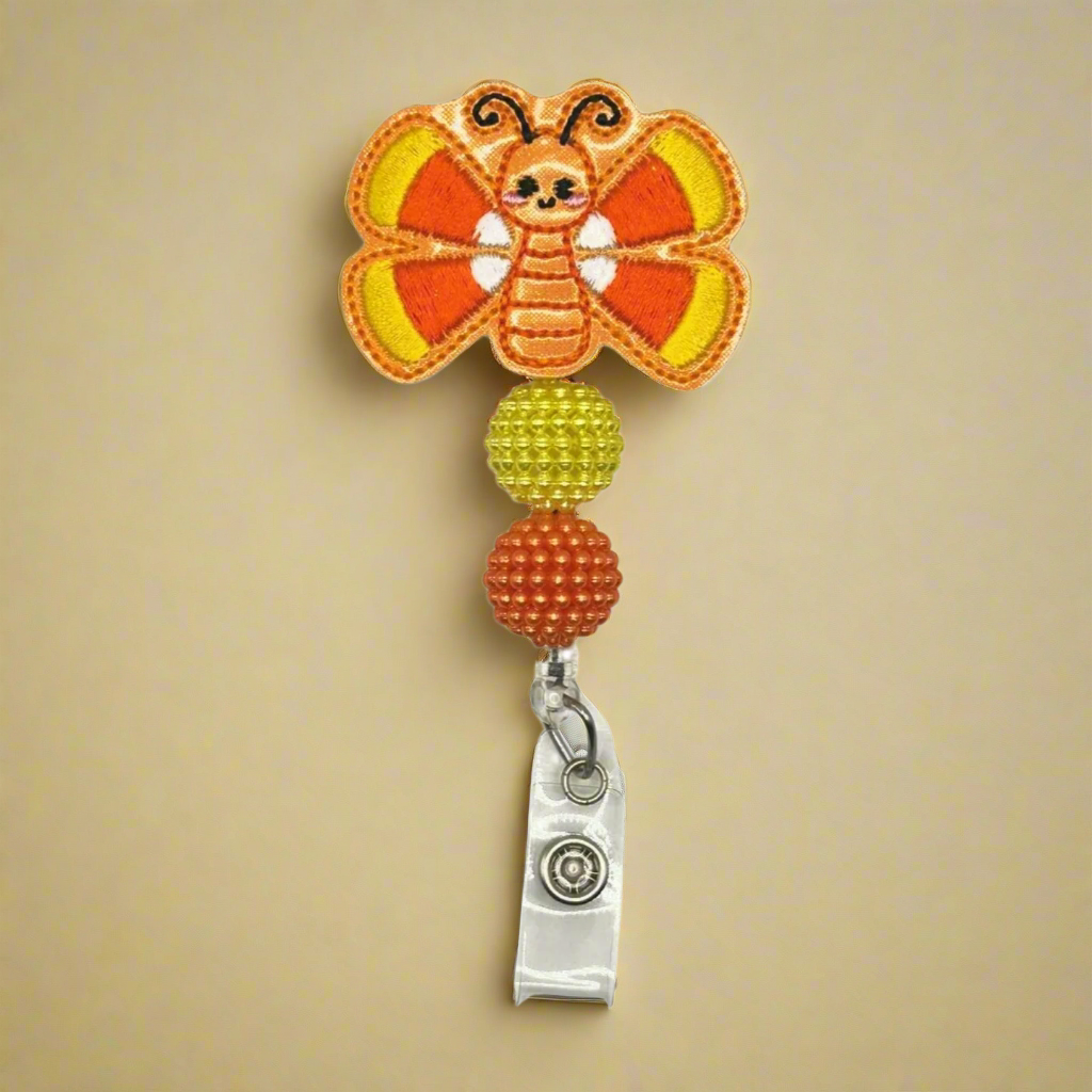 Candy Corn Butterfly Badge Reel