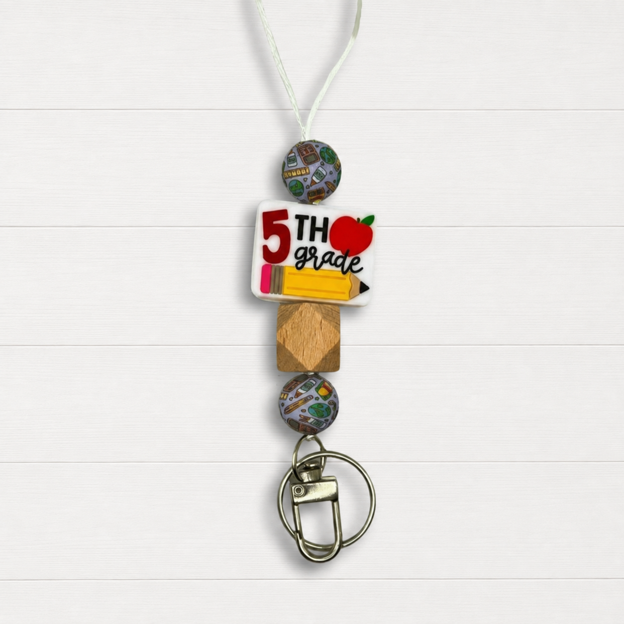 5th Grade Lanyard on a clean white wood background