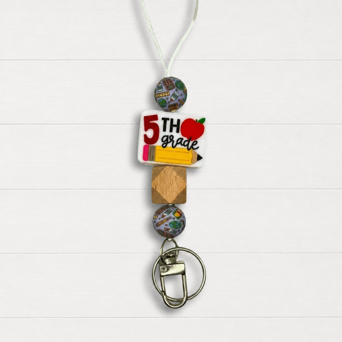 5th Grade Lanyard on a clean white wood background