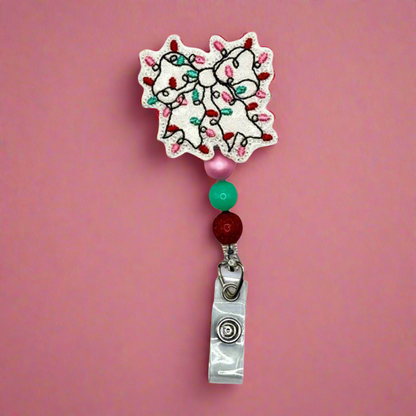 Christmas Light Bow Badge Reel