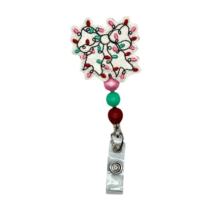 Christmas Light Bow Badge Reel