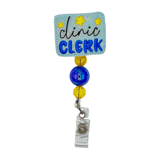 Badge holder with 'Clinic Clerk' text on a blue background