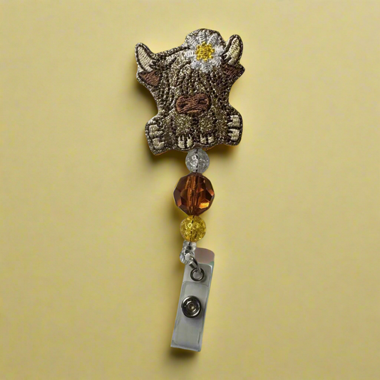 Highland Cow with Daisy Badge Reel